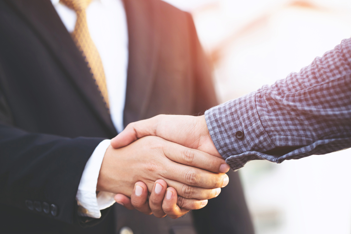 Business People Shake Hands